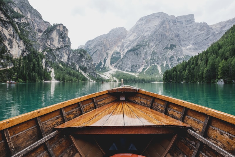 Alpine lake from wooden boat
